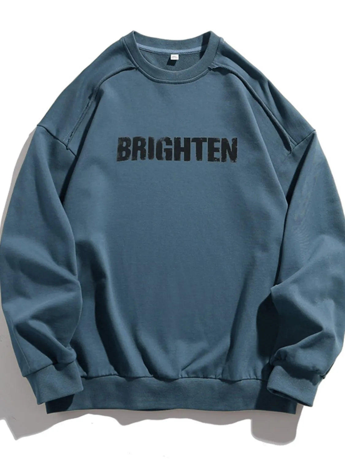 Men's Letter Graphic Round Neck Long Sleeve Sweatshirt - Premium Men's Sweatshirts from Trendsi - Just $49.94! Shop now at Handbags Specialist Headquarter