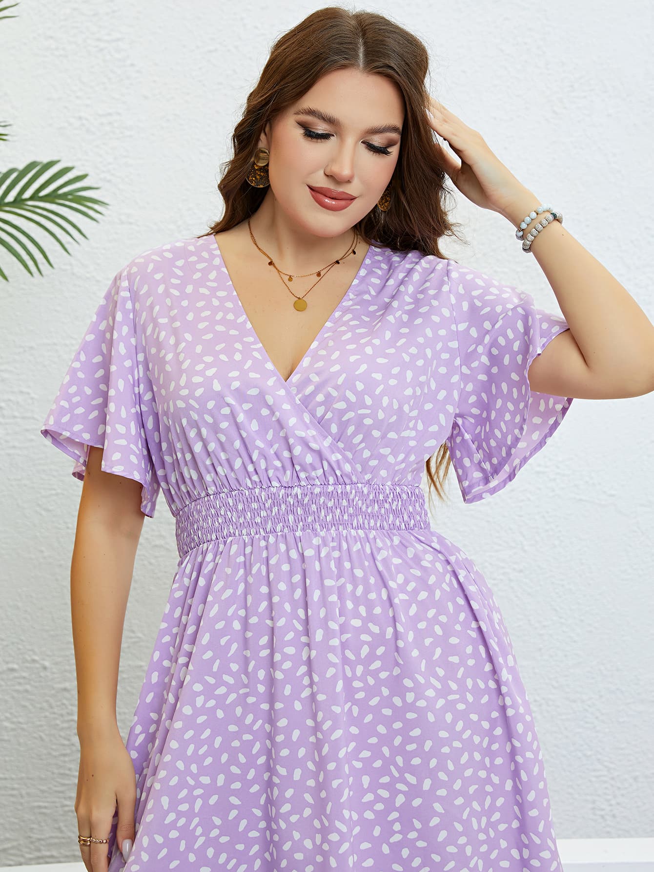 Honey Plus Size Printed Smocked Waist Surplice Dress - Premium Dresses from Trendsi - Just $32.99! Shop now at Handbags Specialist Headquarter