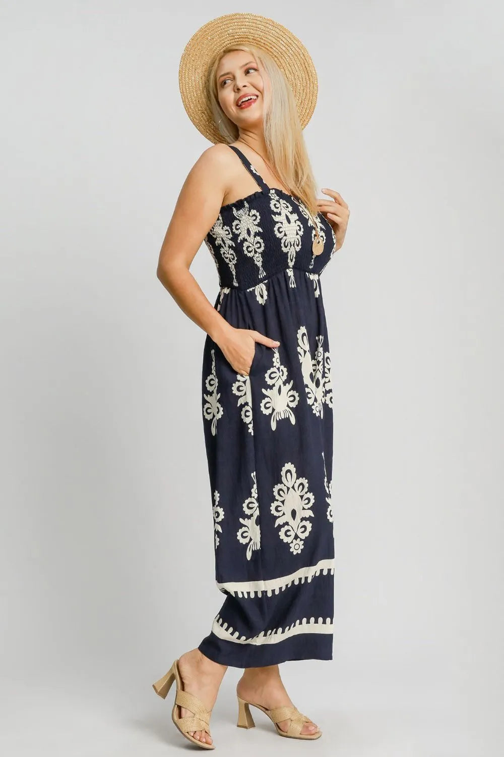 Umgee Full Size Smocked Printed Wide Leg Jumpsuit Plus Size - Premium Dresses from Trendsi - Just $55.99! Shop now at Handbags Specialist Headquarter