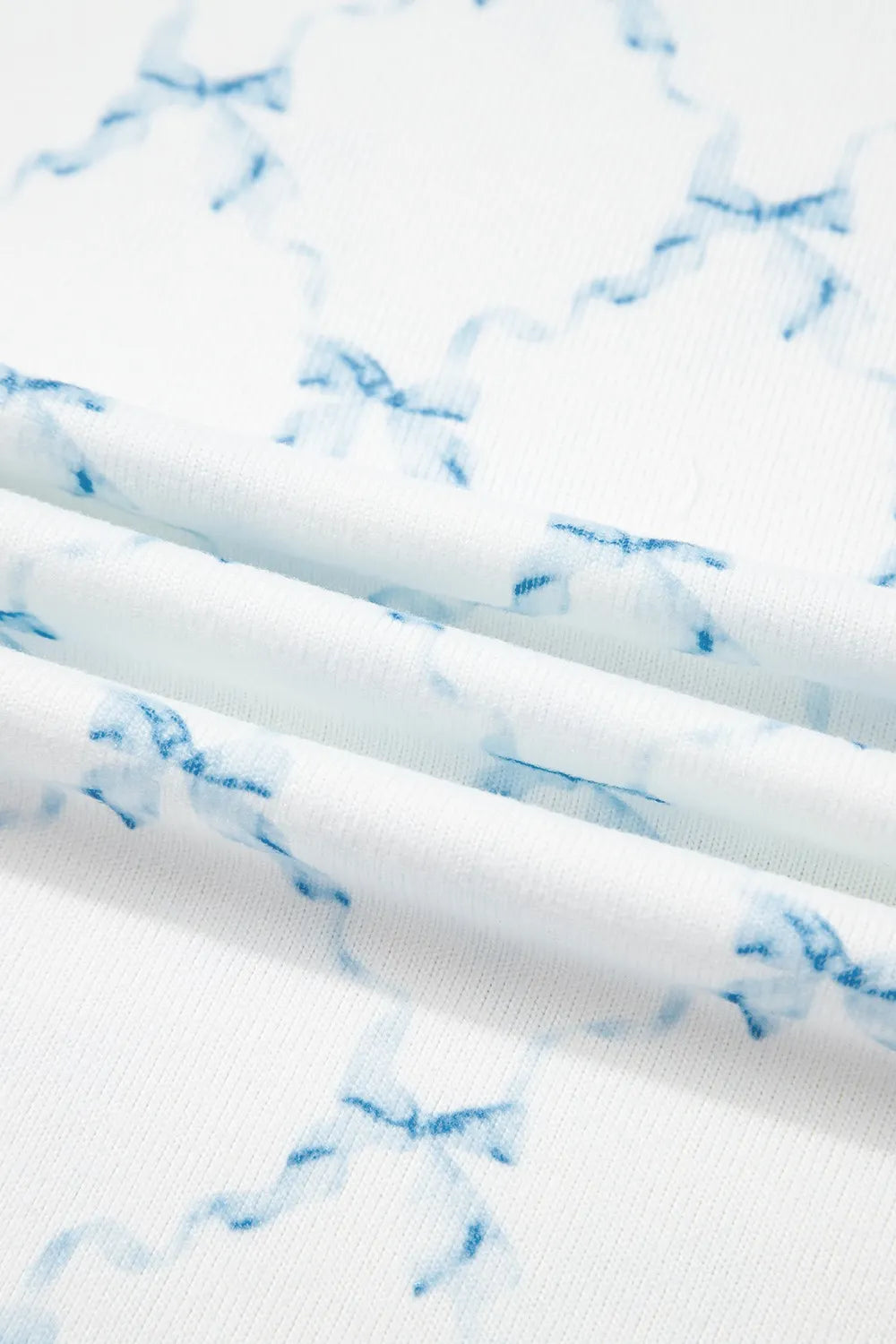 Printed Round Neck Top and Shorts Two-Piece Lounge Set - Premium Sleepwear from Trendsi - Just $39.99! Shop now at Handbags Specialist Headquarter