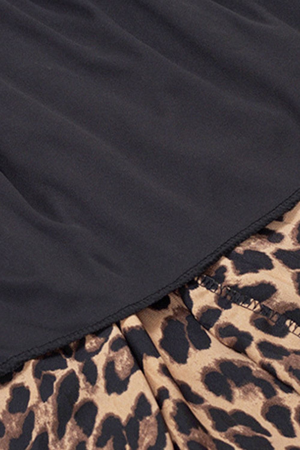 Plus Size Leopard Elastic Waist Midi Skirt - Premium from Trendsi - Just $34.99! Shop now at Handbags Specialist Headquarter