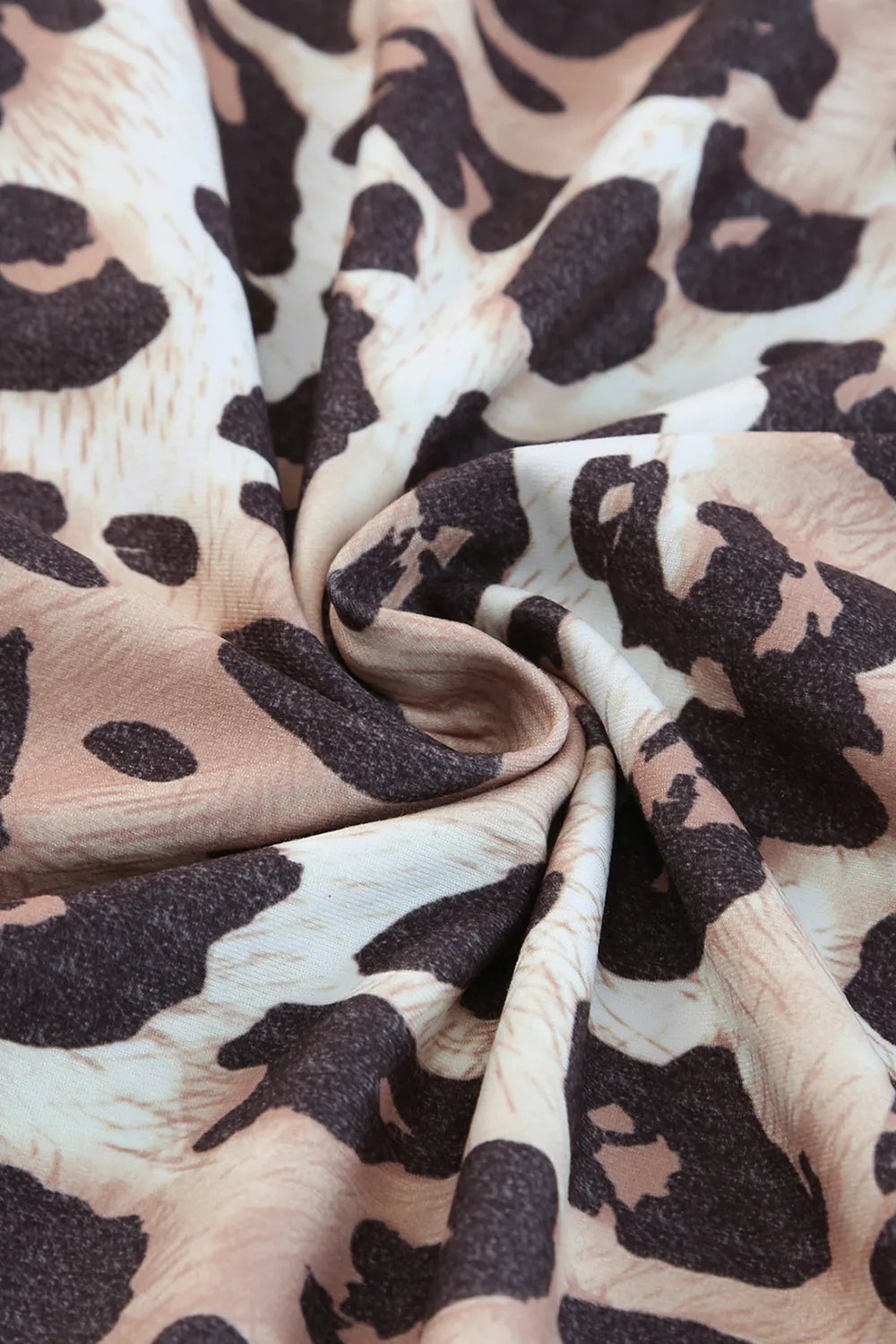 Plus Size Leopard Round Neck Blouse - Premium Plus Size Shirts from Trendsi - Just $21.48! Shop now at Handbags Specialist Headquarter