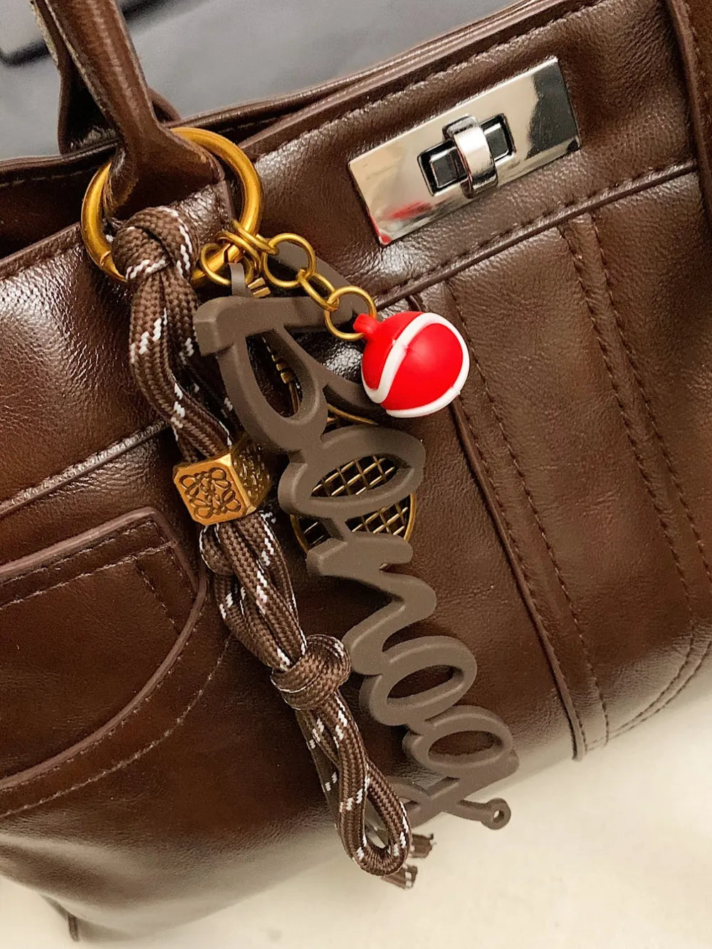 PU Leather Handbag with Pendant - Premium Tote Bag from Trendsi - Just $40.99! Shop now at Handbags Specialist Headquarter