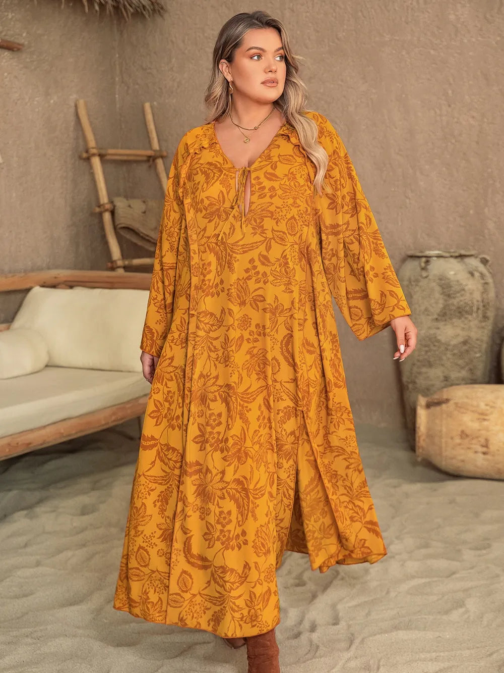 Plus Size Printed Slit Long Sleeve Dress - Premium Dresses from Trendsi - Just $41.99! Shop now at Handbags Specialist Headquarter