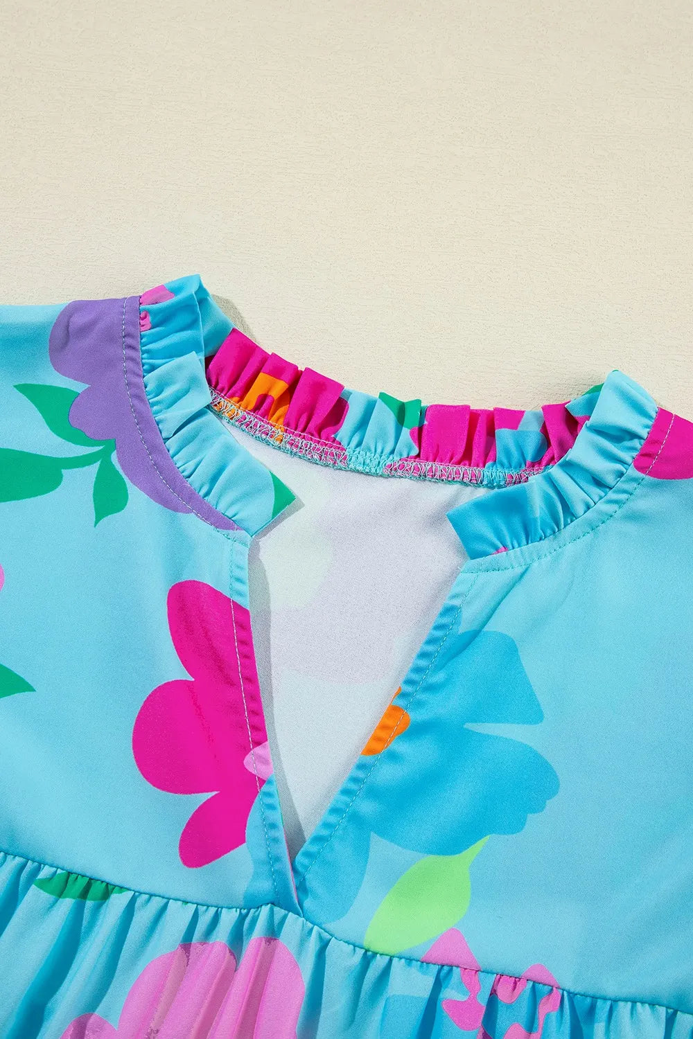 Plus Size Peplum Printed Notched Blouse - Premium Plus Size Shirts from Trendsi - Just $28.66! Shop now at Handbags Specialist Headquarter