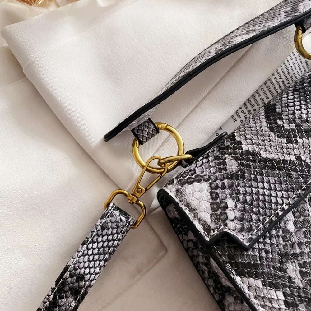 PU Leather Snakeskin Print Crossbody Bag - Premium Crossbody Bag from Trendsi - Just $35.99! Shop now at Handbags Specialist Headquarter