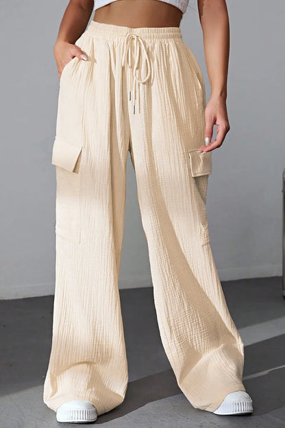 Drawstring Pocketed Wide Leg Pants - Premium Women Pants from Trendsi - Just $40.99! Shop now at Handbags Specialist Headquarter