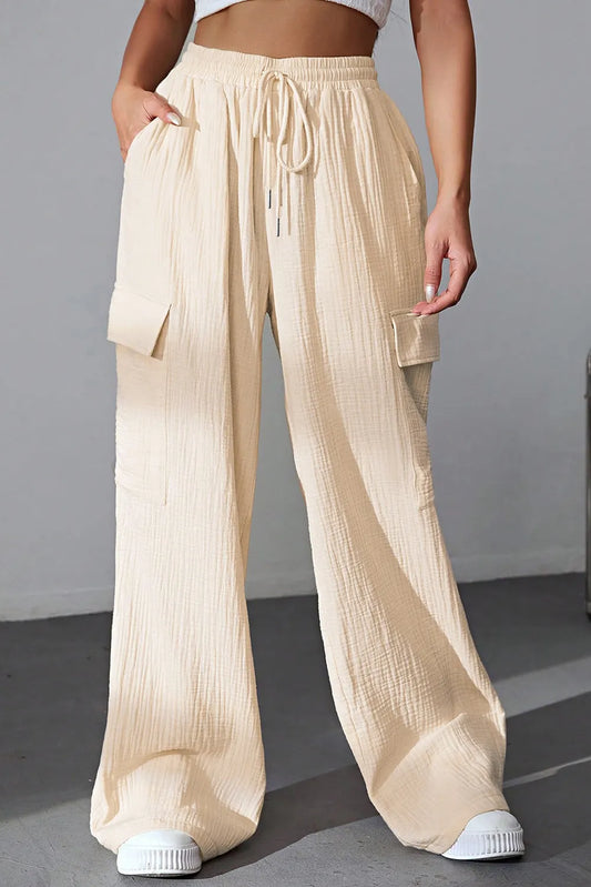 Drawstring Pocketed Wide Leg Pants - Premium Women Pants from Trendsi - Just $40.99! Shop now at Handbags Specialist Headquarter
