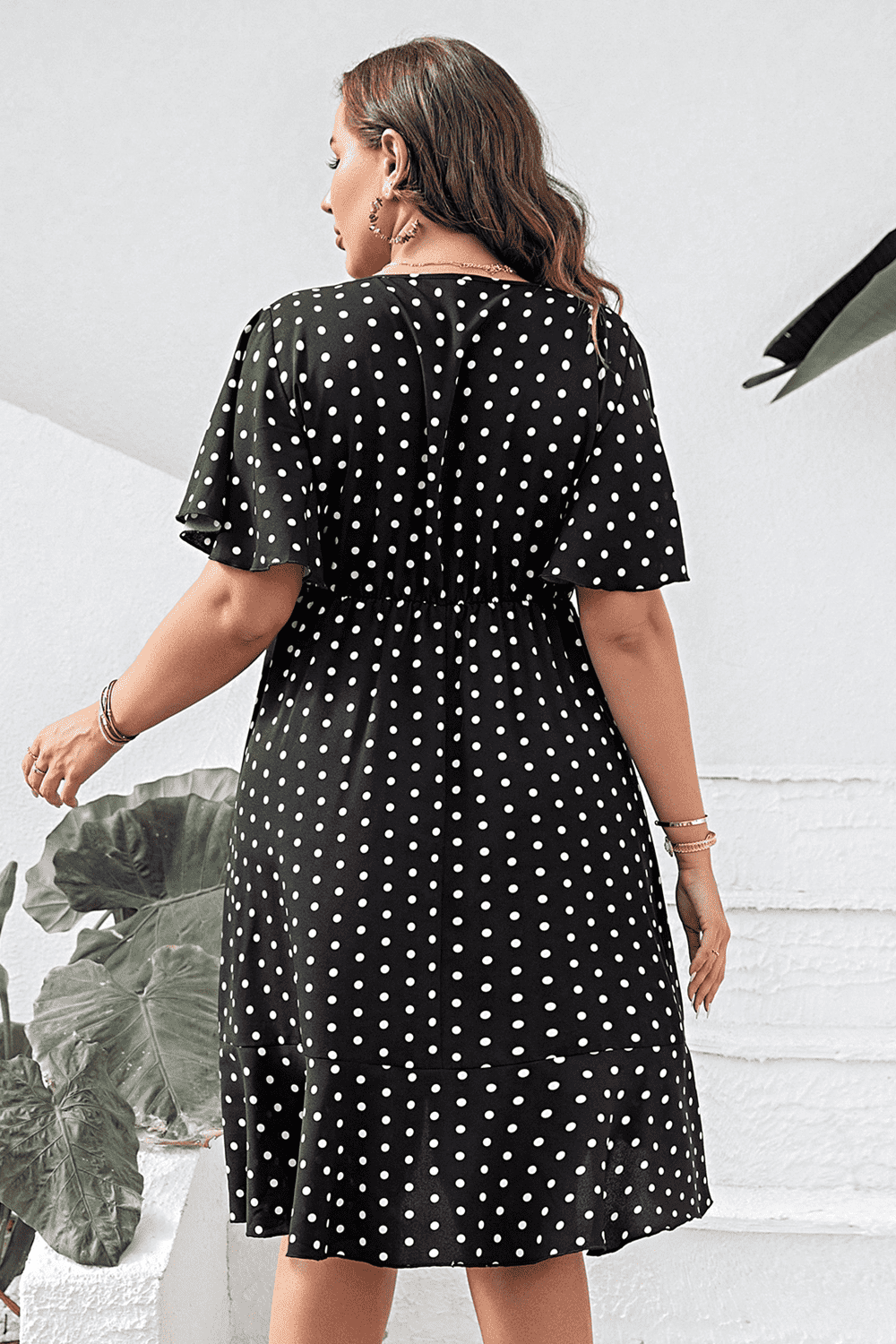 Plus Size Polka Dot Flutter Sleeve Dress - Premium Dresses from Trendsi - Just $46.99! Shop now at Handbags Specialist Headquarter