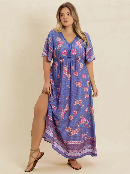 Plus Size Printed V-Neck Flutter Sleeve Dress - Premium Dresses from Trendsi - Just $38.99! Shop now at Handbags Specialist Headquarter