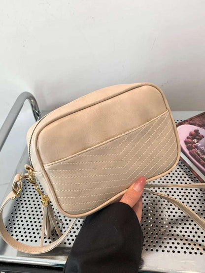 Tassel PU Leather Printed Strap Cassette Crossbody Bag - Premium Crossbody Bag from Trendsi - Just $22.99! Shop now at Handbags Specialist Headquarter