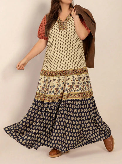 Plus Size Ruched Printed Short Sleeve Midi Dress - Premium Dresses from Trendsi - Just $52.99! Shop now at Handbags Specialist Headquarter