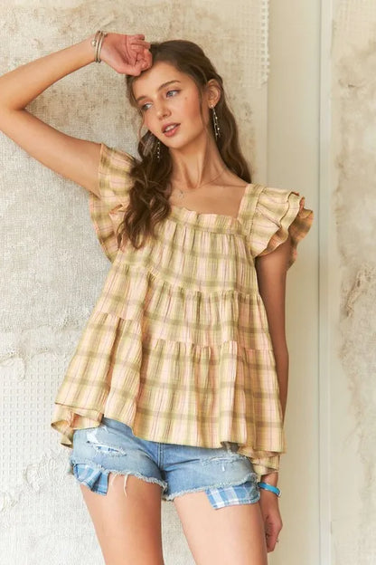 ADORA Ruffled Square Neck Cap Sleeve Babydoll Blouse - Premium Tops from Trendsi - Just $38.80! Shop now at Handbags Specialist Headquarter