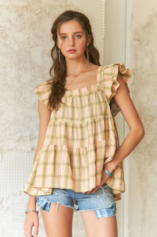 ADORA Ruffled Square Neck Cap Sleeve Babydoll Blouse - Premium Tops from Trendsi - Just $38.80! Shop now at Handbags Specialist Headquarter