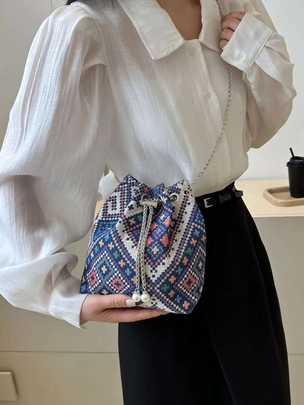 Printed Chain Bucket Bag - Premium Crossbody Bag from Trendsi - Just $19.99! Shop now at Handbags Specialist Headquarter