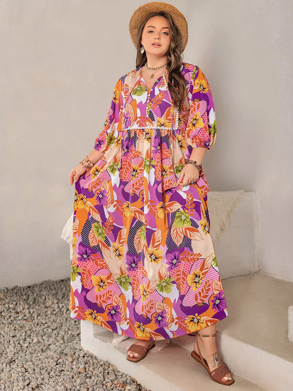 Plus Size Printed Tie Neck Maxi Dress - Premium Dresses from Trendsi - Just $46.99! Shop now at Handbags Specialist Headquarter