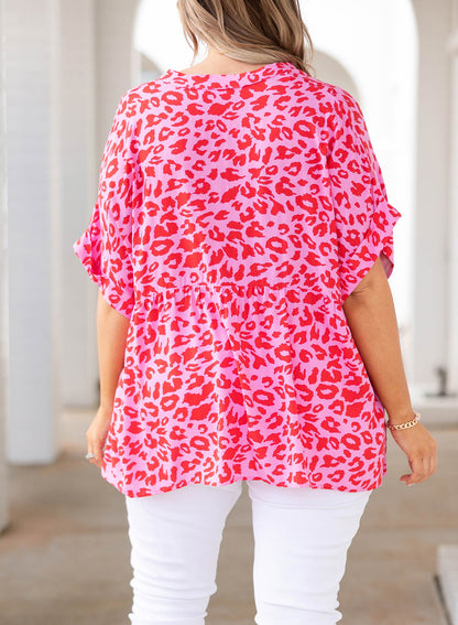 Plus Size Printed Notched Neck Half Sleeve Top - Premium Plus Size Shirts from Trendsi - Just $28! Shop now at Handbags Specialist Headquarter
