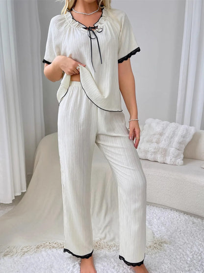 Contrast Trim Short Sleeve Top and Pants Set - Premium Sleepwear from Trendsi - Just $44.99! Shop now at Handbags Specialist Headquarter