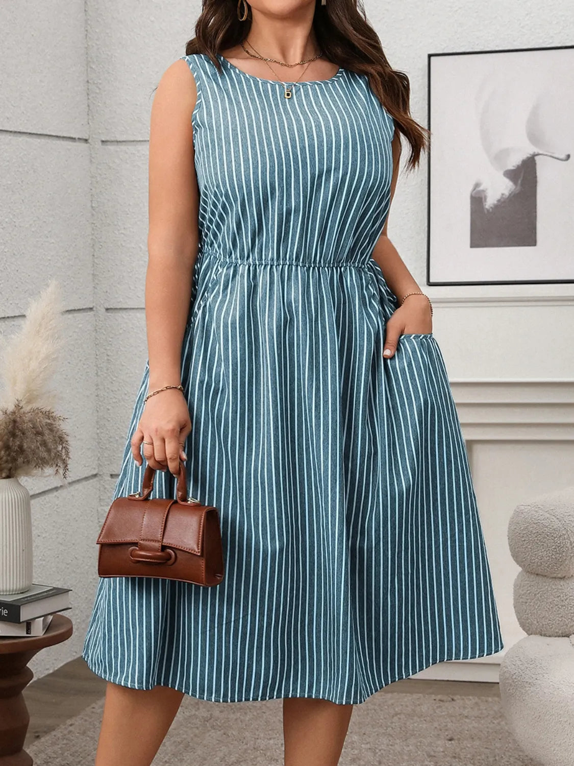 Plus Size Striped Round Neck Sleeveless Dress - Premium Dresses from Trendsi - Just $40.99! Shop now at Handbags Specialist Headquarter