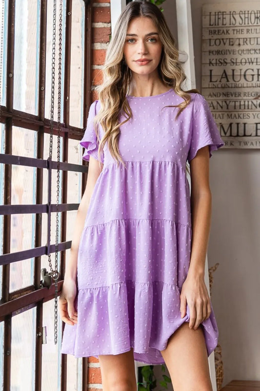 Heimish Full Size Swiss Dot Short Sleeve Tiered Dress - Premium Dresses from Trendsi - Just $39.99! Shop now at Handbags Specialist Headquarter