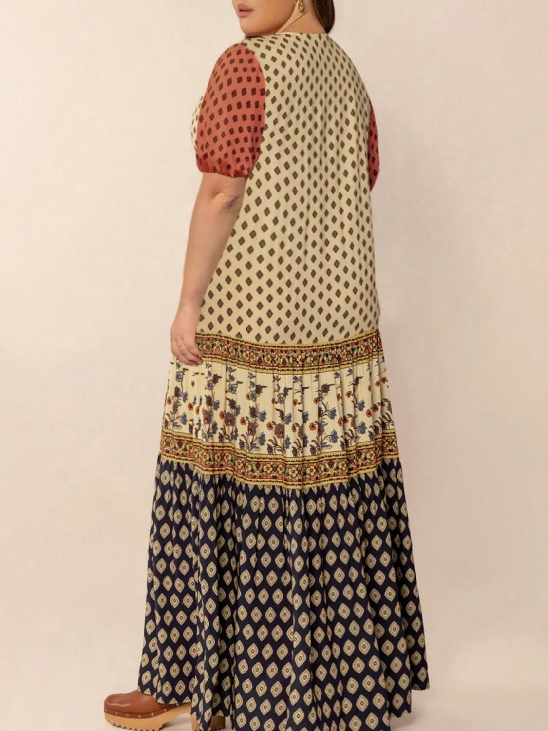 Plus Size Ruched Printed Short Sleeve Midi Dress - Premium Dresses from Trendsi - Just $52.99! Shop now at Handbags Specialist Headquarter