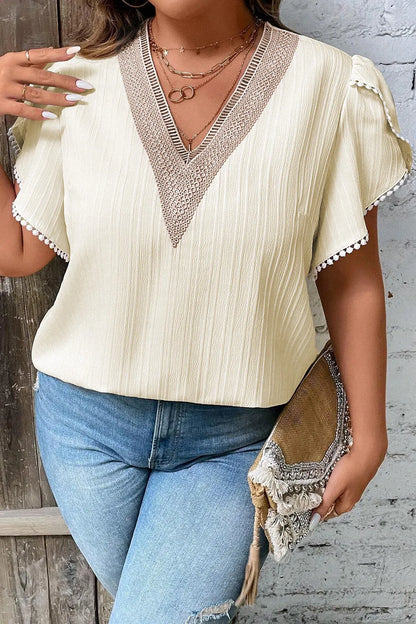 Plus Size V-Neck Petal Sleeve Blouse - Premium Plus Size Shirts from Trendsi - Just $19.96! Shop now at Handbags Specialist Headquarter
