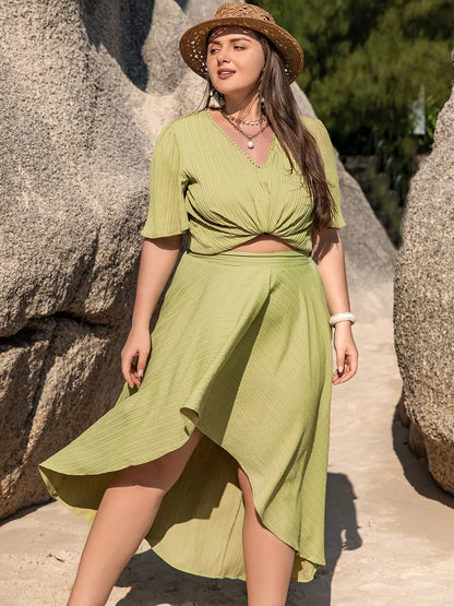 Plus Size V-Neck Half Sleeve Top and High-Low Skirt Set - Premium  from Trendsi - Just $47.99! Shop now at Handbags Specialist Headquarter