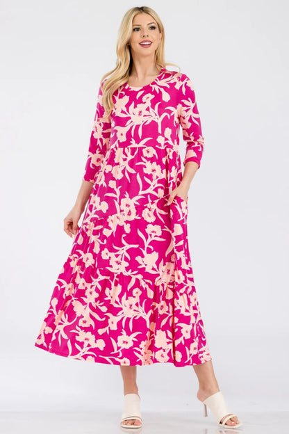 Celeste Full Size Floral Round Neck Ruffle Hem Dress - Premium Dresses from Trendsi - Just $50.99! Shop now at Handbags Specialist Headquarter