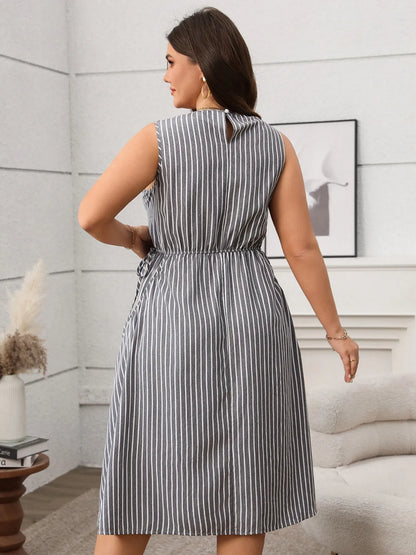 Plus Size Striped Round Neck Sleeveless Dress - Premium Dresses from Trendsi - Just $40.99! Shop now at Handbags Specialist Headquarter