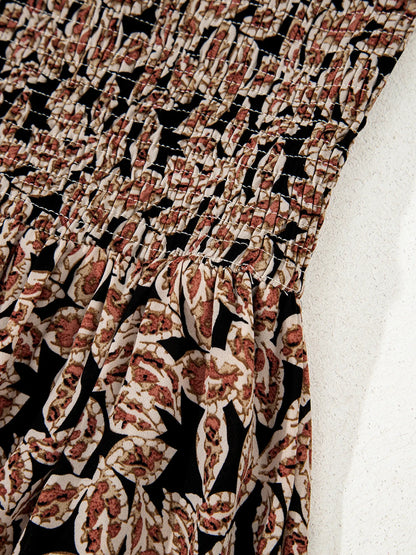 Printed Smocked Bodice Maxi Dress - Premium Maxi Dress from Trendsi - Just $57.99! Shop now at Handbags Specialist Headquarter