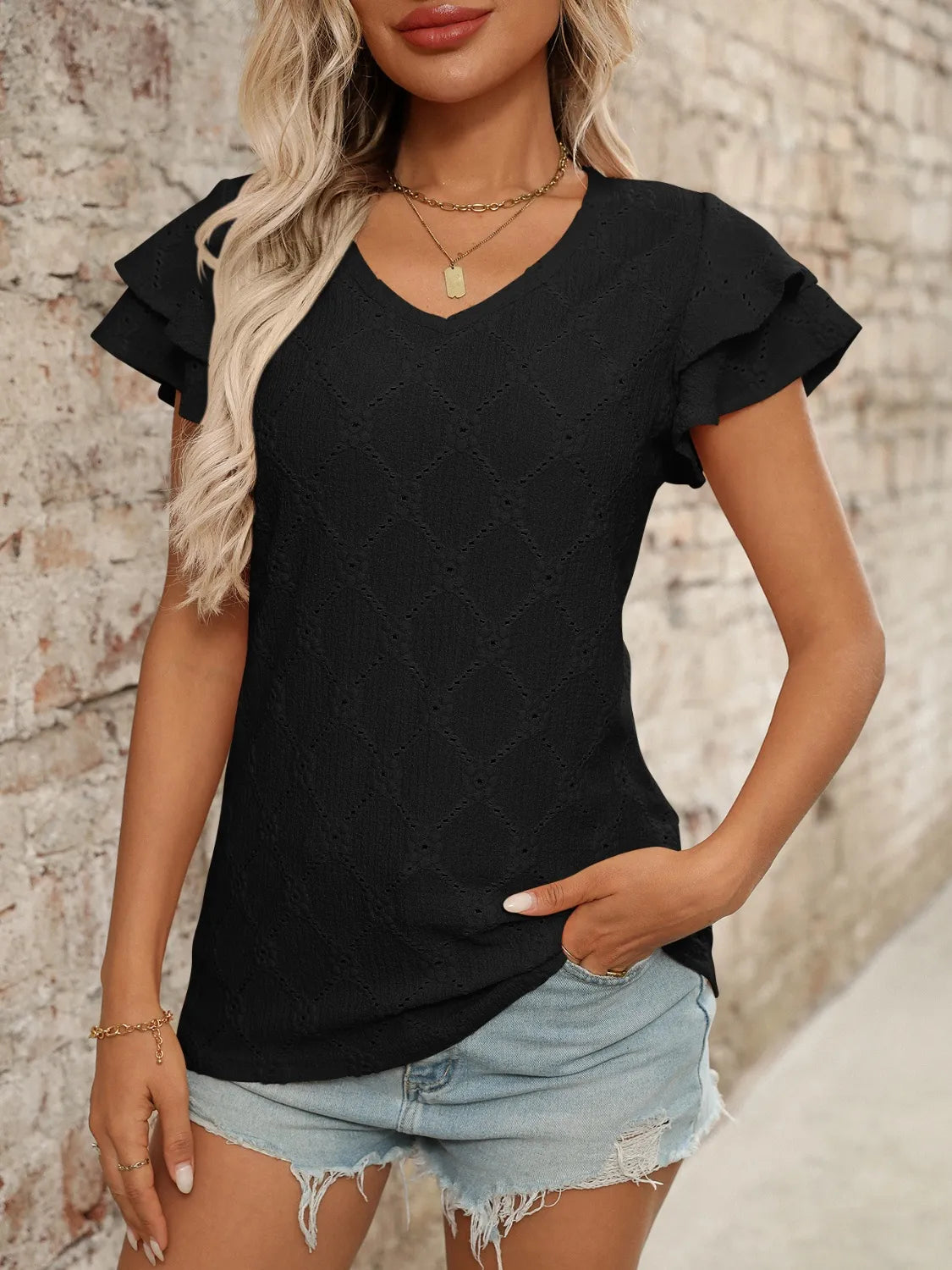 Eyelet V-Neck Ruffled Cap Sleeve Top - Premium Tops from Trendsi - Just $20.68! Shop now at Handbags Specialist Headquarter