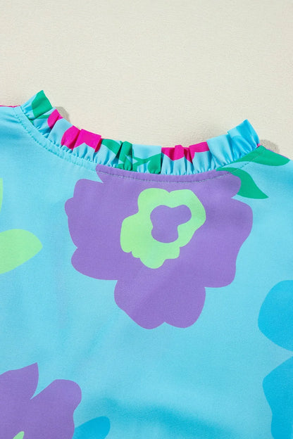 Plus Size Peplum Printed Notched Blouse - Premium Plus Size Shirts from Trendsi - Just $28.66! Shop now at Handbags Specialist Headquarter