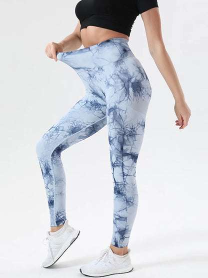 Tie-Dye High Waist Active Leggings - Premium Leggings from Trendsi - Just $41.40! Shop now at Handbags Specialist Headquarter