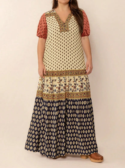 Plus Size Ruched Printed Short Sleeve Midi Dress - Premium Dresses from Trendsi - Just $52.99! Shop now at Handbags Specialist Headquarter