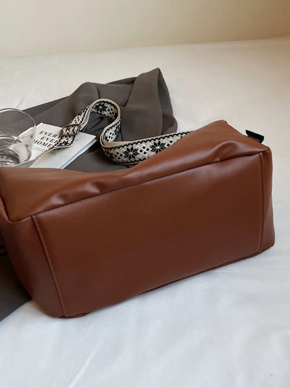 PU Leather Adjustable Strap Crossbody Bag - Premium Crossbody Bag from Trendsi - Just $26.99! Shop now at Handbags Specialist Headquarter