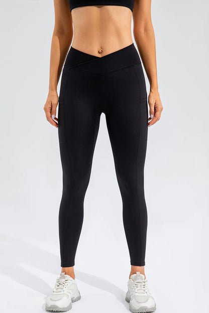 High Waist Active Leggings with Pockets - Premium Leggings from Trendsi - Just $47.28! Shop now at Handbags Specialist Headquarter