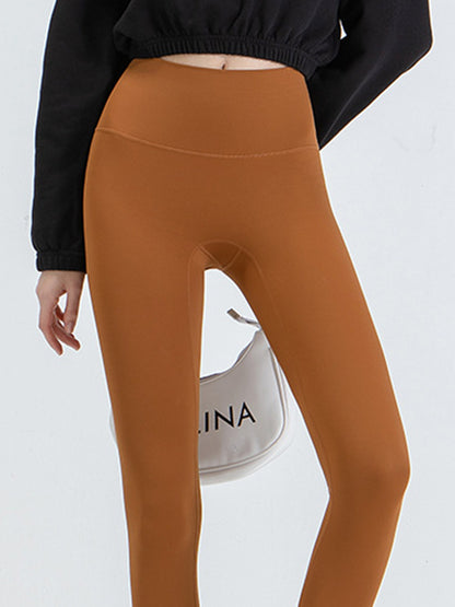 Wide Waistband Sports Leggings - Premium Leggings from Trendsi - Just $52.05! Shop now at Handbags Specialist Headquarter