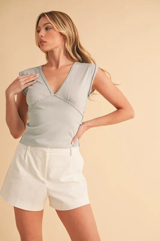 Aemi+Co V-Neck Cap Sleeve Cropped Top - Premium Women / Tops from Trendsi - Just $32.64! Shop now at Handbags Specialist Headquarter