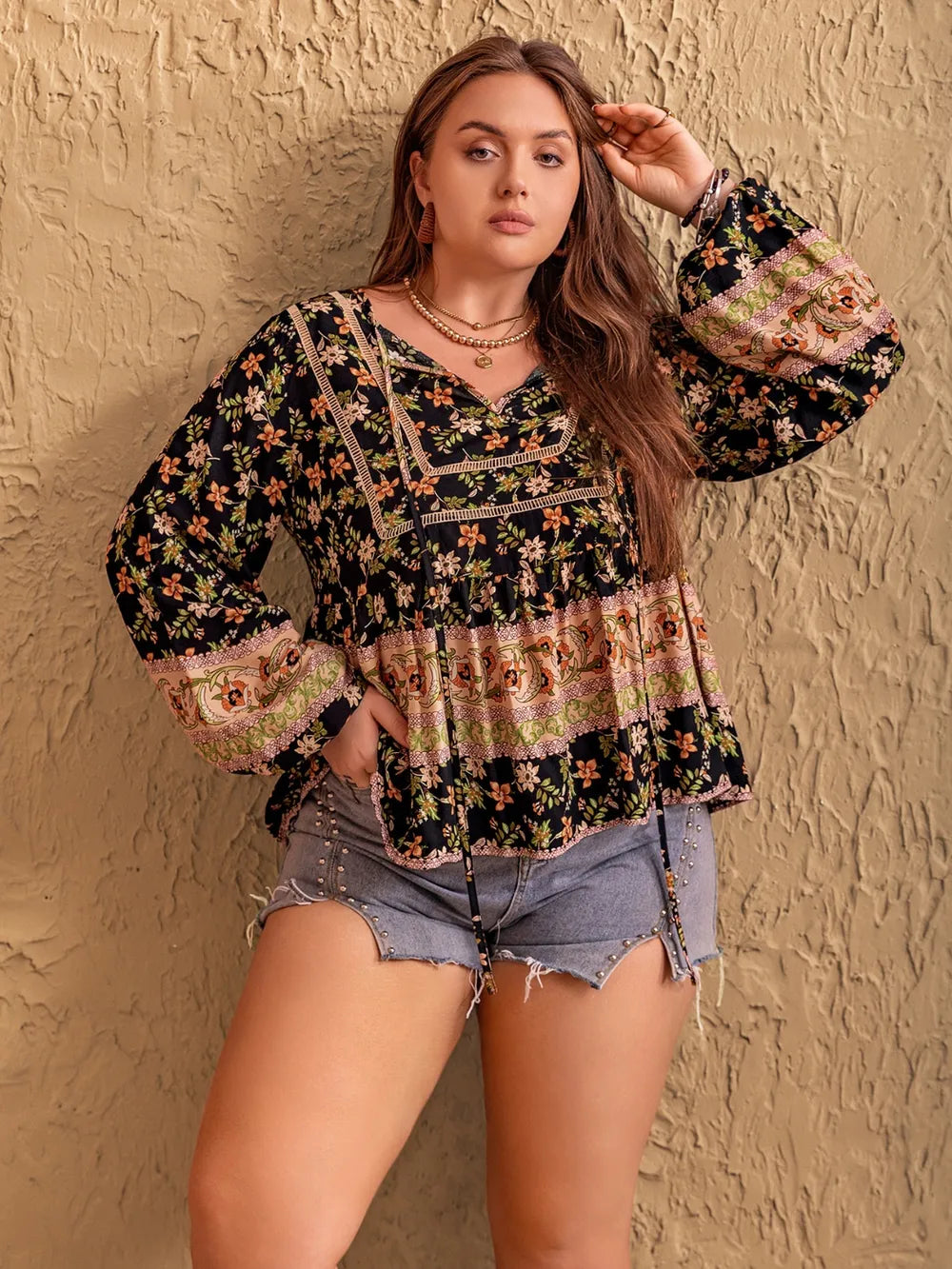 Plus Size Printed Tie Neck Balloon Sleeve Blouse - Premium Plus Size Shirts from Trendsi - Just $29.98! Shop now at Handbags Specialist Headquarter