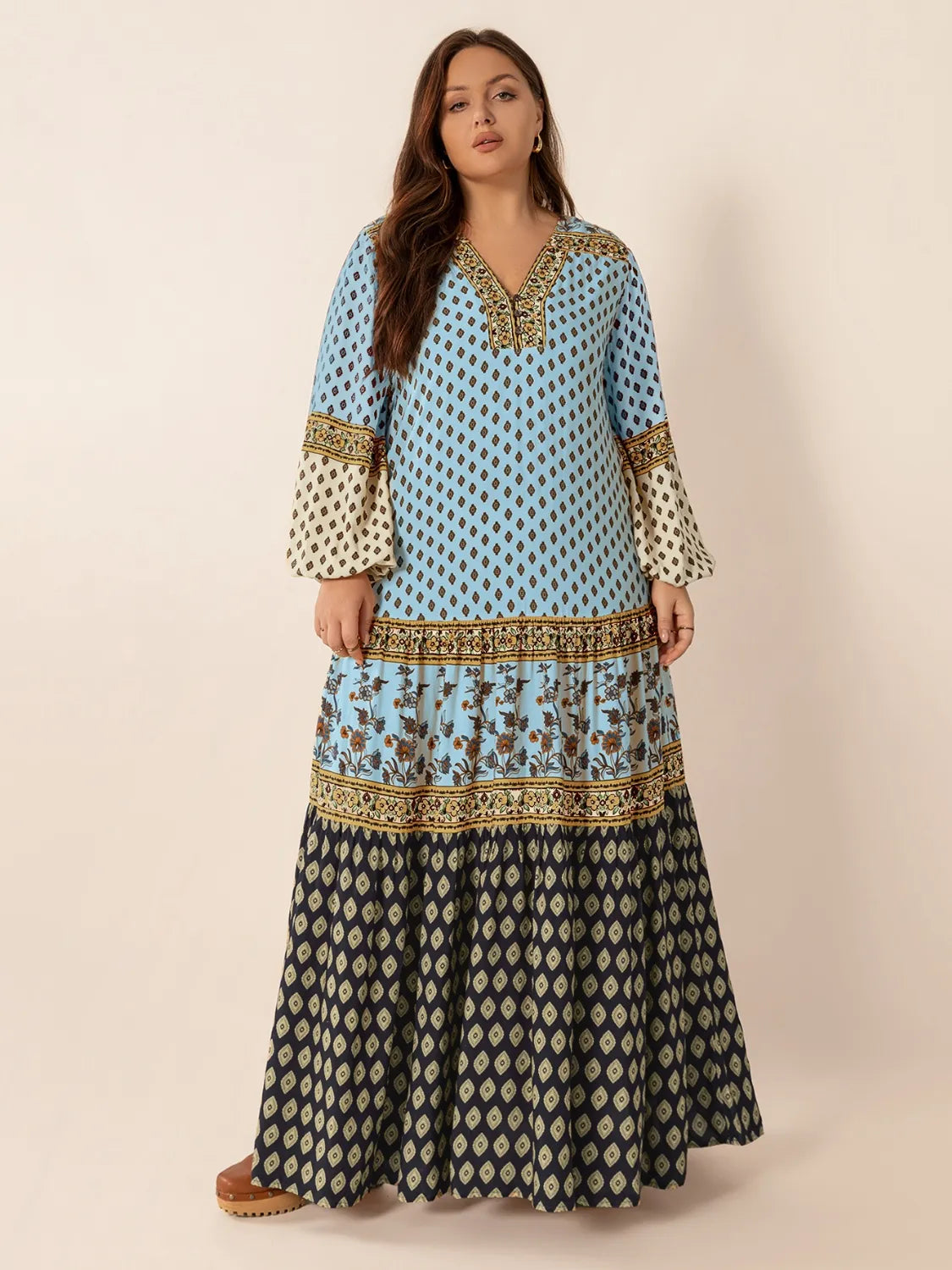 Plus Size Printed V-Neck Balloon Sleeve Maxi Dress - Premium Dresses from Trendsi - Just $52.99! Shop now at Handbags Specialist Headquarter