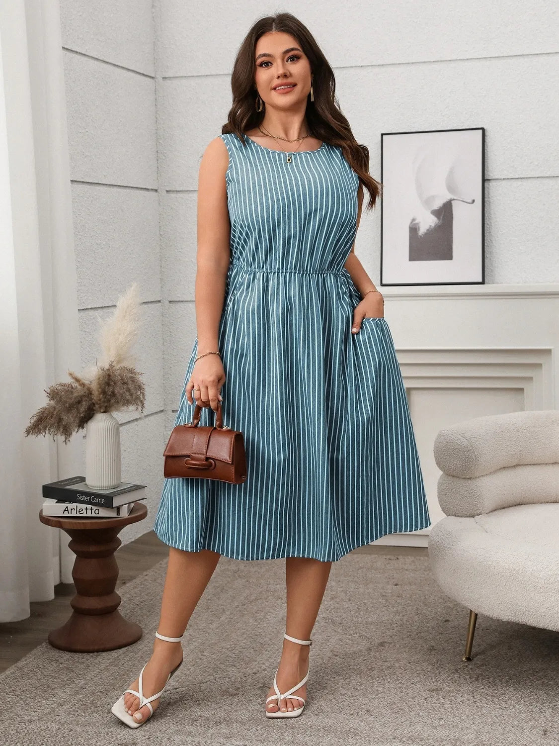 Plus Size Striped Round Neck Sleeveless Dress - Premium Dresses from Trendsi - Just $40.99! Shop now at Handbags Specialist Headquarter