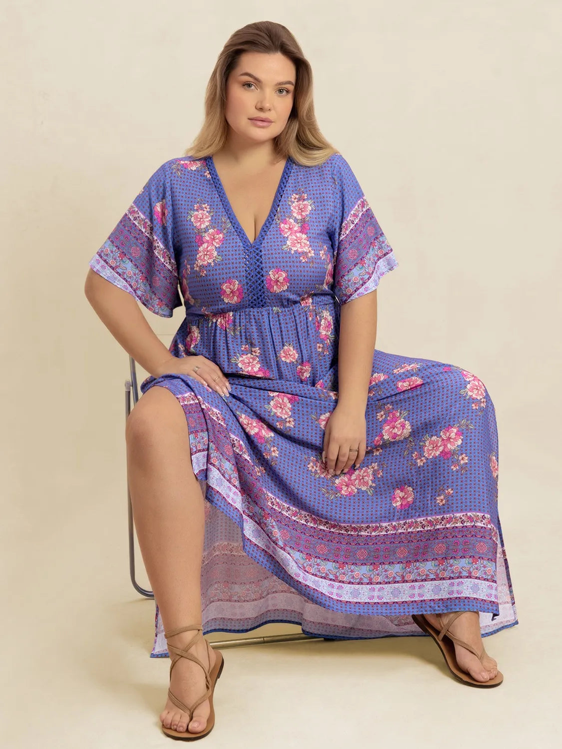 Plus Size Printed V-Neck Flutter Sleeve Dress - Premium Dresses from Trendsi - Just $38.99! Shop now at Handbags Specialist Headquarter