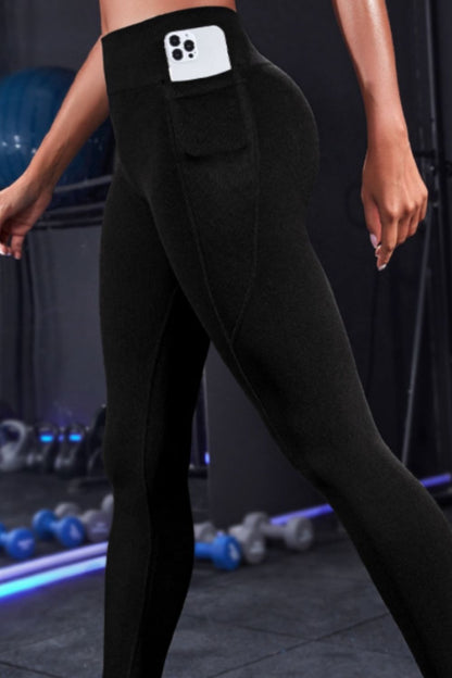 Wide Waistband Sports Leggings - Premium Leggings from Trendsi - Just $34.83! Shop now at Handbags Specialist Headquarter