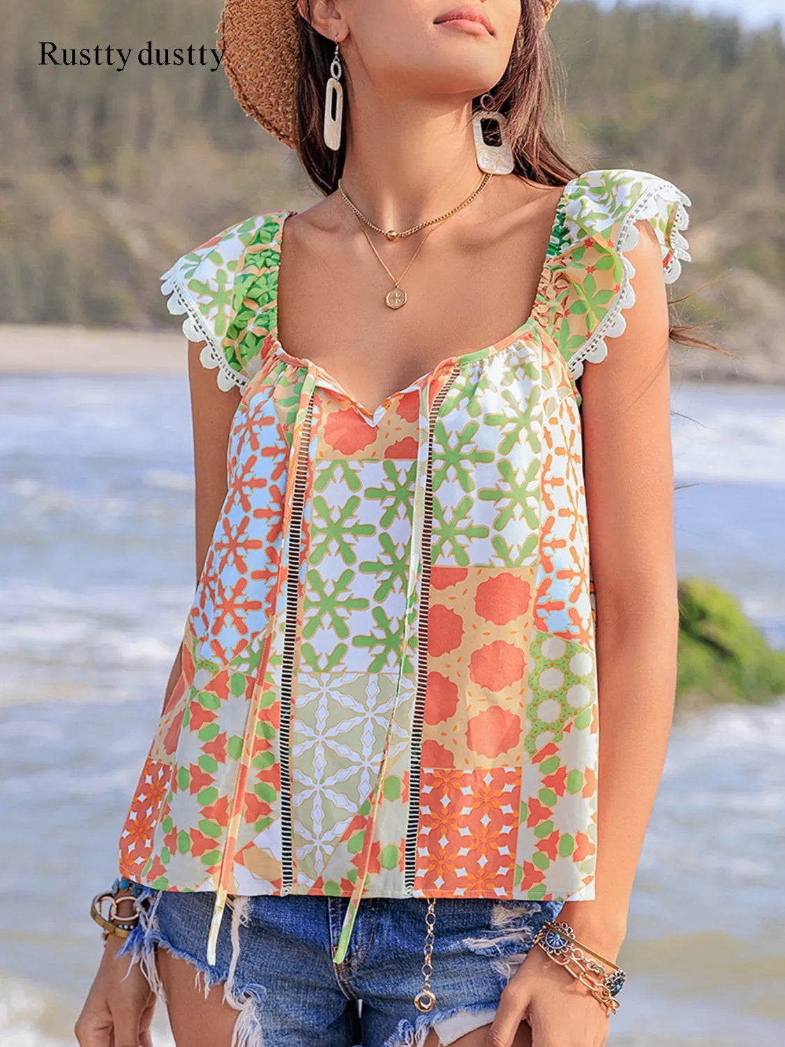 Lace Detail Printed Tie Neck Cap Sleeve Blouse - Premium Tops from Trendsi - Just $16.82! Shop now at Handbags Specialist Headquarter