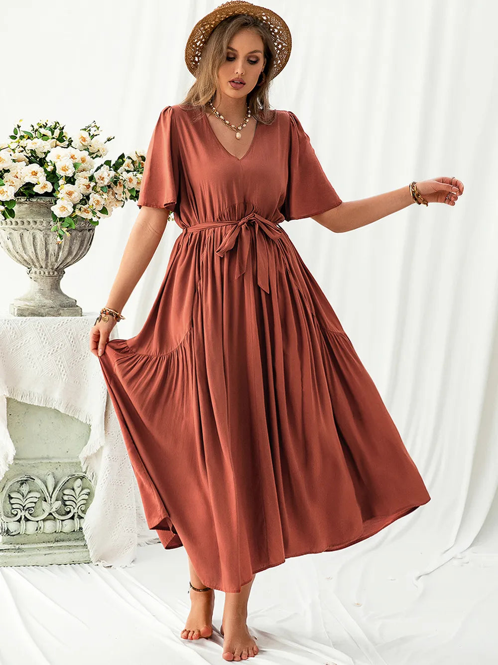 Plus Size V-Neck Flutter Sleeve Midi Dress - Premium Dresses from Trendsi - Just $46.99! Shop now at Handbags Specialist Headquarter