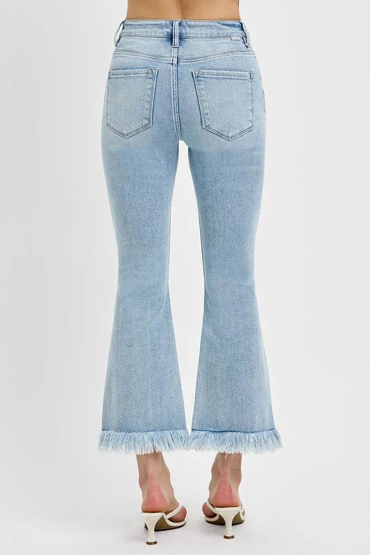 RISEN Full Size Raw Hem Distressed Cropped Flare Jeans Plus Size - Premium Women / Jeans & Denim from Trendsi - Just $53.99! Shop now at Handbags Specialist Headquarter