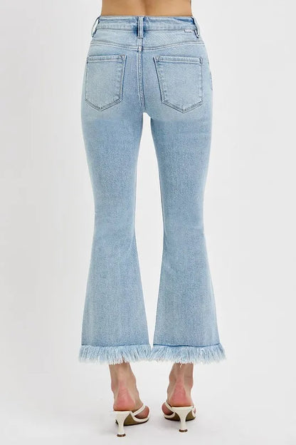 RISEN Full Size Raw Hem Distressed Cropped Flare Jeans Plus Size - Premium Women / Jeans & Denim from Trendsi - Just $53.99! Shop now at Handbags Specialist Headquarter