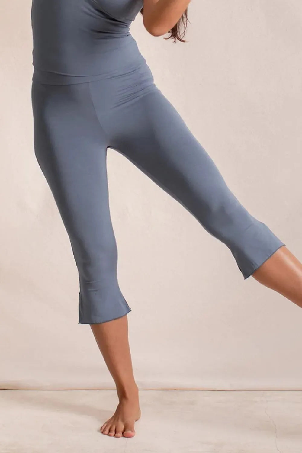 Side Slit Capris Leggings - Premium Leggings from Trendsi - Just $29.40! Shop now at Handbags Specialist Headquarter