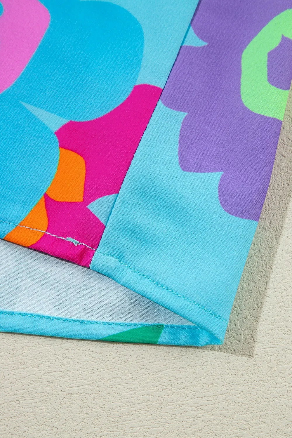 Plus Size Peplum Printed Notched Blouse - Premium Plus Size Shirts from Trendsi - Just $28.66! Shop now at Handbags Specialist Headquarter