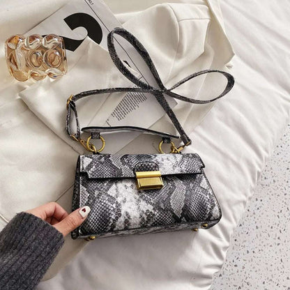PU Leather Snakeskin Print Crossbody Bag - Premium Crossbody Bag from Trendsi - Just $35.99! Shop now at Handbags Specialist Headquarter